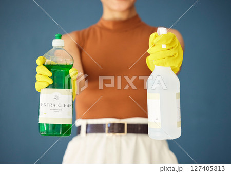 Product for cleaning, home maintenance and cleaning service, chemical and soap for hygiene mockup. Spring cleaning, spray bottle and detergent advertising, woman with gloves against studio background 127405813