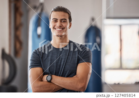 Gym, fitness and portrait of proud man standing with smile, motivation, health and energy for training. Coach, personal trainer or happy boxing club owner in studio for workout, coaching and wellness 127405814