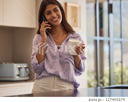 Phone call, kitchen and woman with coffee and smile in morning planning day and talking in home. Communication, conversation and girl drinking coffee or tea on phone to discuss news in apartment. 127405874