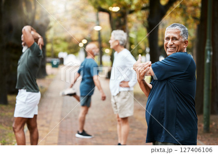Fitness, exercise and stretching with a senior man getting ready for a workout or training outdoor at the park. Health, wellness and performance with elderly male at the start of his routine in group 127406106