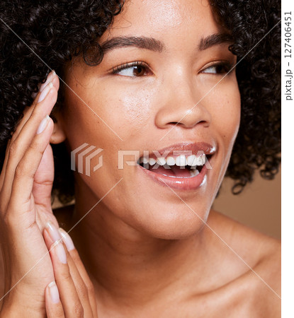 Face, beauty and skincare with a model black woman in studio for luxury, wellness or treatment. Makeup, thinking and natural care with an attractive young female posing for dermatology or cosmetics Face, beauty and skincare with a model black woman in studio for luxury, wellness or treatment. Makeup, thinking and natural care with an attractive young female posing for dermatology or cosmetics 127406451