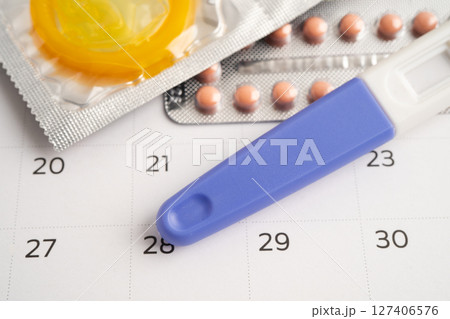 Pregnancy test and birth control pills, contraception health and medicine. 127406576