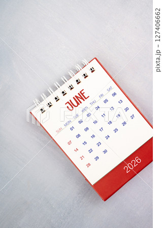 June 2026 on gray color wooden table, Flat lay. June 2026 on gray color wooden table, Flat lay. 127406662