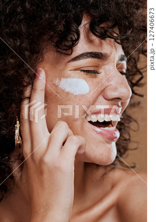 Happy woman, face cream and beauty, makeup product and sunscreen facial treatment for aesthetic shine. Young model, face freckles and body lotion, cosmetics and healthy skincare, wellness and melasma Happy woman, face cream and beauty, makeup product and sunscreen facial treatment for aesthetic shine. Young model, face freckles and body lotion, cosmetics and healthy skincare, wellness and melasma 127406673