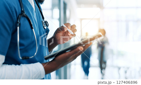 Hands, nurse and man in hospital, tablet or stylus with communication, shift schedule and internet. Closeup, person and medical with professional, healthcare and diagnosis report with test results 127406896