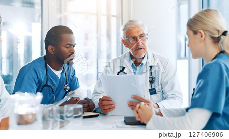 Documents, doctor and people in hospital, meeting or planning for shift schedule. Group, employees or medical with professional, paperwork or feedback for funding report or review for cancer research Documents, doctor and people in hospital, meeting or planning for shift schedule. Group, employees or medical with professional, paperwork or feedback for funding report or review for cancer research 127406906