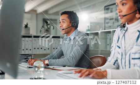 Computer, contact us and support with man in call center for assistance, feedback or online help. Communication, consulting and headset with virtual assistant at desk in office for customer service 127407112