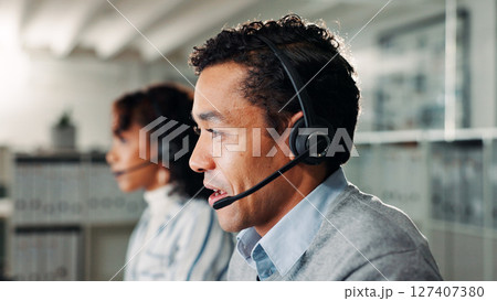 Headset, man and call center agent in office for lead generation, crm or help desk consultation. Audio tech, customer service and male technical support consultant with online query in workplace. Headset, man and call center agent in office for lead generation, crm or help desk consultation. Audio tech, customer service and male technical support consultant with online query in workplace. 127407380