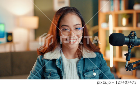 Happy, microphone and portrait of woman streamer with confidence for podcast, talk show or chat. Smile, entertainment and face of female presenter with recording equipment for live streaming in home 127407475