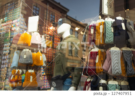 Colorful Winter Accessories Displayed in Krakow Shop Window 127407951