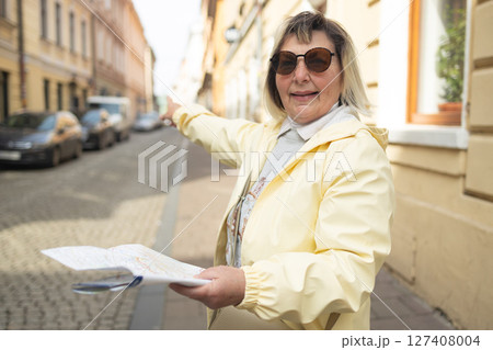 Senior Woman Exploring City with Map 127408004