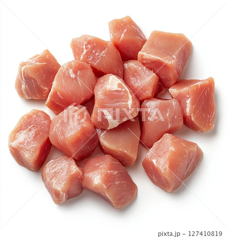 Fresh raw meat cubes arranged on white background, close-up food ingredient concept 127410819