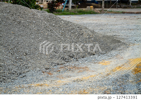 Construction site action pile of gravel urban road construction environment close-up view Construction site action pile of gravel urban road construction environment close-up view 127413391