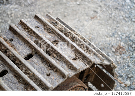 Rusty machinery close-up industrial site equipment detail outdoor macro perspective 127413587