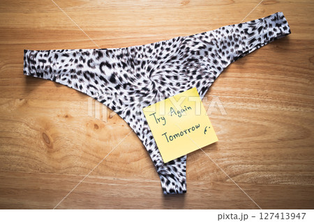 Underwear note a unique reminder a stylish thong home casual creative concept 127413947