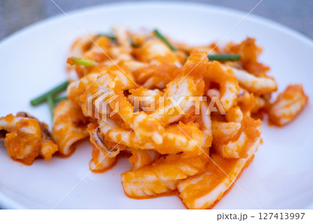 Delicious octopus dish coastal restaurant food natural light close-up culinary art 127413997