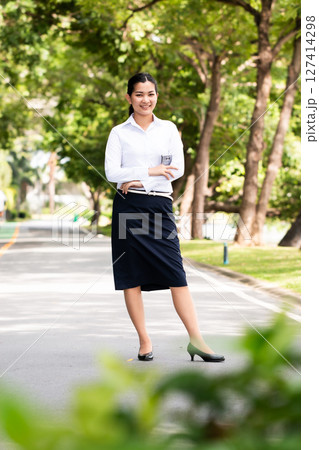 Businesswoman's journey travel thailand modern lifestyle urban setting outdoor viewpoint 127414298