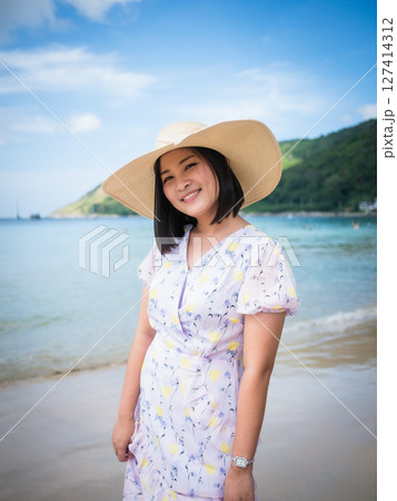 Relaxing travel moments by the beach thailand lifestyle portrait tropical paradise bright and cheerful 127414312