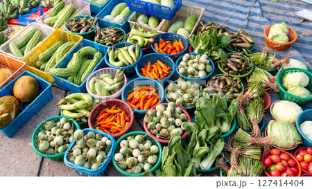 Vibrant vegetable market scene local bazaar food urban environment overhead view fresh produce collection 127414404