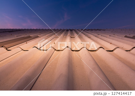 Roofing installation process urban area industrial setting aerial view construction concept Roofing installation process urban area industrial setting aerial view construction concept 127414417