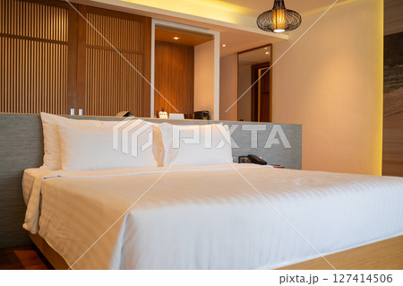 Relaxing hotel bedroom retreat modern accommodation interior design cozy atmosphere wide angle comfort & style Relaxing hotel bedroom retreat modern accommodation interior design cozy atmosphere wide angle comfort & style 127414506