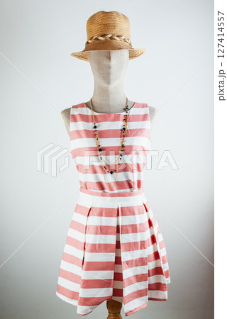 Stylish summer outfit fashion studio dress display indoor front view trendy look 127414557