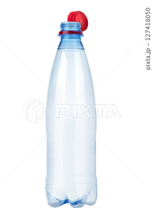 Empty plastic bottle standing on white background with red cup 127418050