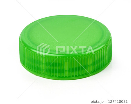Green plastic bottle cap isolated on white background Green plastic bottle cap isolated on white background 127418081