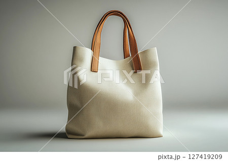 Reusable shopping bag made of fabric on a white background. 127419209