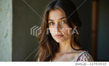 In a tranquil setting, a young woman stands poised with an expressive gaze. Soft natural light highlights her features, creating an atmosphere of contemplation and beauty Generative AI 127419310