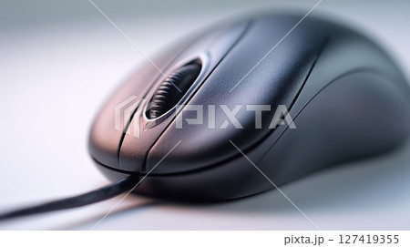 Ergonomic desk setup featuring a left-oriented computer mouse and minimal modern design elements 127419355