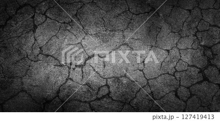 Cracked Black concrete Surface Texture. Grunge Background. Stock photo. 127419413