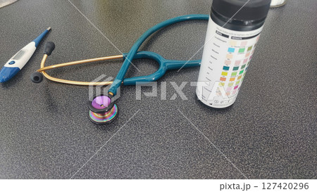 At the check-up to make sure that growth and development are correct. Stethoscope, litmus test, medical props, concept of check-up, health check 127420296