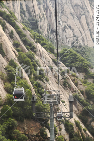 Cable car is used to travel from the bottom to the top of Yuntaishan Park is the most beautiful geological park in Henan Province, China. 127421571