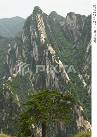 Mount Huashan is one of the most famous tourist attractions in China and one of the must-do activities is rock climbing and hiking. It is a sacred mountain, home to many deities. Mount Huashan is one of the most famous tourist attractions in China and one of the must-do activities is rock climbing and hiking. It is a sacred mountain, home to many deities. 127421819