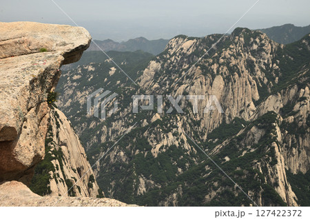 Mount Huashan is one of the most famous tourist attractions in China and one of the must-do activities is rock climbing and hiking. It is a sacred mountain, home to many deities. Mount Huashan is one of the most famous tourist attractions in China and one of the must-do activities is rock climbing and hiking. It is a sacred mountain, home to many deities. 127422372