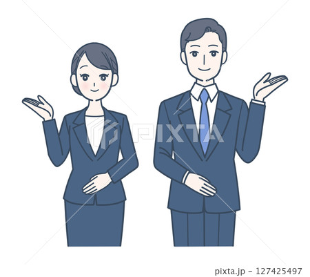 笑顔で案内するスーツ姿の男女 127425497