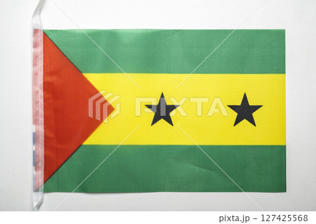 Closeup view of the Sao Tome and Principe national flag isolated over a white background. Concept of government and nationality 127425568