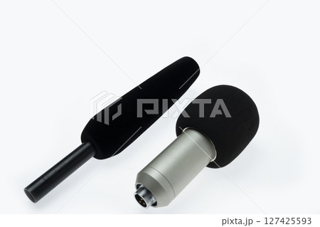 Two studio microphone for podcasting or streaming isolated over a white background 127425593