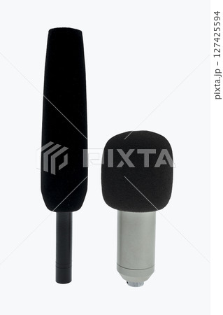 Two studio microphone for podcasting or streaming isolated over a white background 127425594