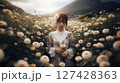 花に囲まれる女性 127428363