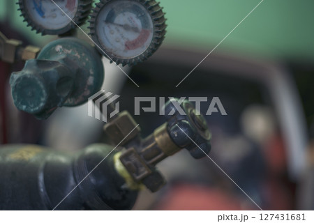 Mechanic tools engineering equipment car auto repair shop with copy space. Blurred background mechanical service. Heavy screw grungy rusted wrenches dirty screwdriver object. Industrial hardware set Mechanic tools engineering equipment car auto repair shop with copy space. Blurred background mechanical service. Heavy screw grungy rusted wrenches dirty screwdriver object. Industrial hardware set 127431681