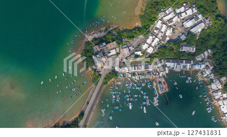 June 7 2021 View of Coastal Village with Boats and Surrounding Greenery June 7 2021 View of Coastal Village with Boats and Surrounding Greenery 127431831
