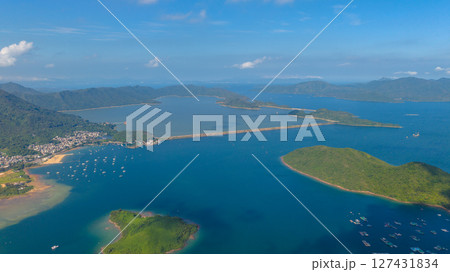 View of Scenic Coastline with Islands and Crystal-Clear Waters View of Scenic Coastline with Islands and Crystal-Clear Waters 127431834
