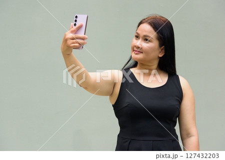 Portrait of Asian mature woman Portrait of Asian mature woman 127432203