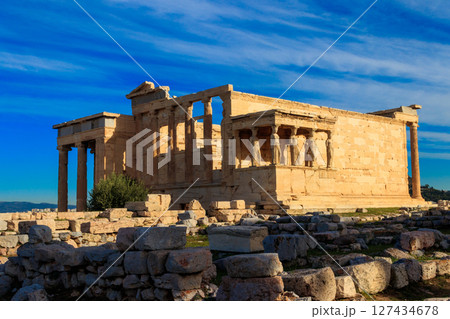 Erechtheion (Erechtheum) or Temple of Athena Polias is an ancient Greek Ionic temple on the north side of the Acropolis in Athens, Greece Erechtheion (Erechtheum) or Temple of Athena Polias is an ancient Greek Ionic temple on the north side of the Acropolis in Athens, Greece 127434678
