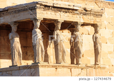 The Caryatid porch of Erechtheion (Erechtheum) or Temple of Athena Polias is an ancient Greek Ionic temple on the north side of the Acropolis in Athens, Greece The Caryatid porch of Erechtheion (Erechtheum) or Temple of Athena Polias is an ancient Greek Ionic temple on the north side of the Acropolis in Athens, Greece 127434679