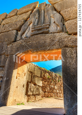 Lion's gate, the main entrance of the citadel of Mycenae. Archaeological site of Mycenae in Peloponnese, Greece Lion's gate, the main entrance of the citadel of Mycenae. Archaeological site of Mycenae in Peloponnese, Greece 127434705