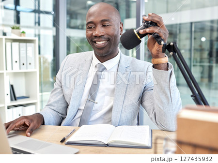 Radio podcast, laptop or black man with microphone interview, networking or communication in office studio. Speaker, internet influencer or corporate content creator with website news live stream 127435932