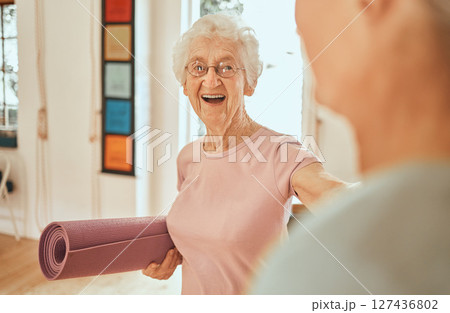 Yoga, fitness and workout with a senior woman holding an exercise mat in a class for wellness. Pilates, training and holistic with a mature female in a studio for mental health or lifestyle balance 127436802